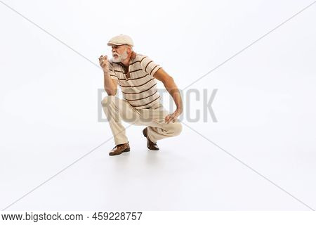 Portrait Of Stylish Senior Man In Retro Style Clothes, Vintage Outfit Posing Isolated On White Backg