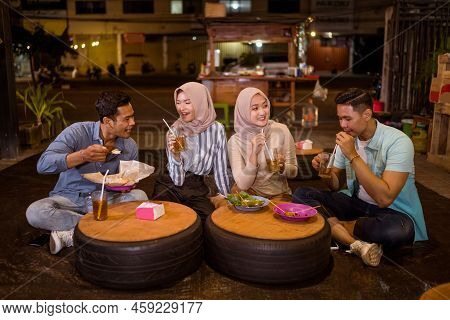Happy Muslim Friend Enjoy Having Iftar Dinner
