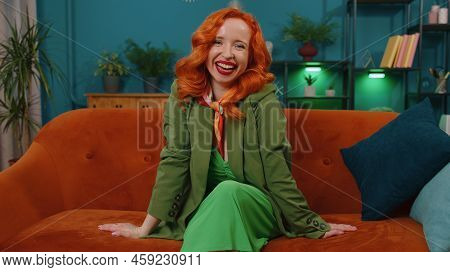 Redhead Young Woman In Green Dress Laughing Out Loud After Hearing Ridiculous Anecdote, Funny Joke, 