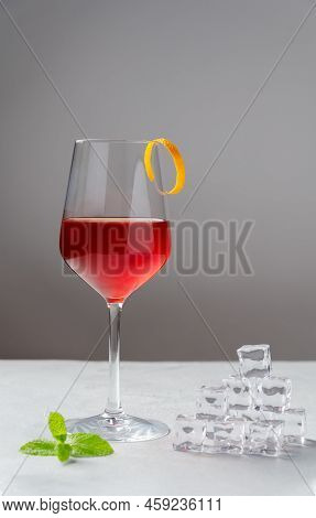 Classic Boulevardier Or Cinquecento Alcoholic Cocktail With Campari, Rye Whiskey And Sweet Vermouth 