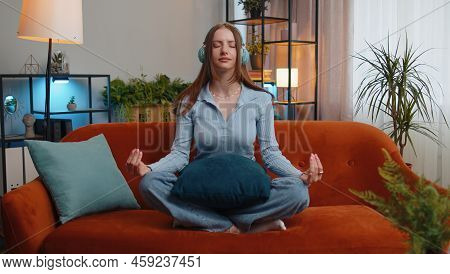 Keep Calm Down, Relax, Inner Balance. Young Woman Breathes Deeply With Mudra Gesture, Eyes Closed Me