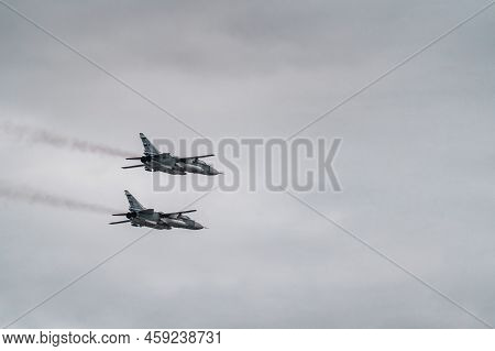 Russia, St. Petersburg, 28 July 2022: Military Aircraft And Helicopters Of The Air Force Fly On The 