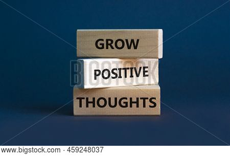 Grow Positive Thoughts Symbol. Concept Words Grow Positive Thoughts On Blocks. Beautiful Grey Backgr