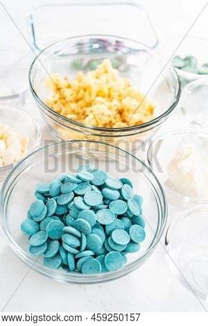Measured Ingredients In Glass Bowls To Prepare Mermaid Cakesicles.