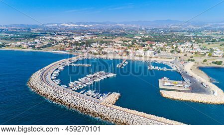 Aerial Bird's Eye View Of Zygi Fishing Village Port, Larnaca, Cyprus. The Fish Boats Moored In The H