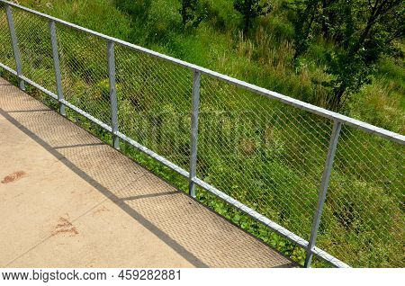 Terrace Fencing, Railings Of Metal Pipes Filled With Steel Cables Cable Mesh. Fencing Wire Stainless