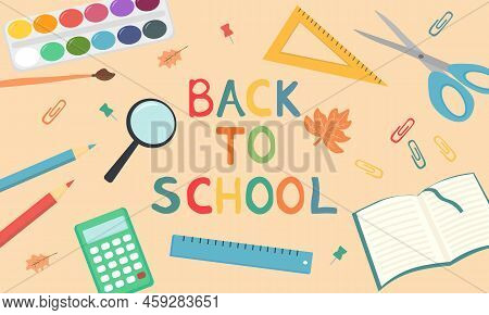Back To School With School Items And Equipments On Beige Background. Top View