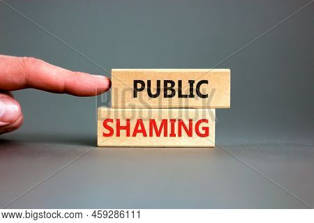 Public Shaming Symbol. Concept Words Public Shaming On Wooden Blocks On A Beautiful Grey Table Grey 