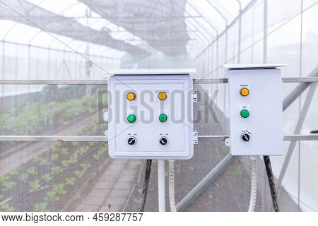 Control Box Water Timer In Organic Farm At Greenhouse. Electric Pipe And Control Box Control Water S