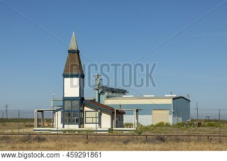 Scenic Landscape In Bakersfield With  Fields, Industry And A Little Church In The Middle Of Nowhere,