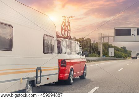 Scenic View Big Modern White Family Rv Camper Van Vehicle Driving On European Highway Road Against S