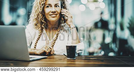 Portrait Of Woman Worker With Laptop And Phone. Female People Calling With Mobile Cellular And Using