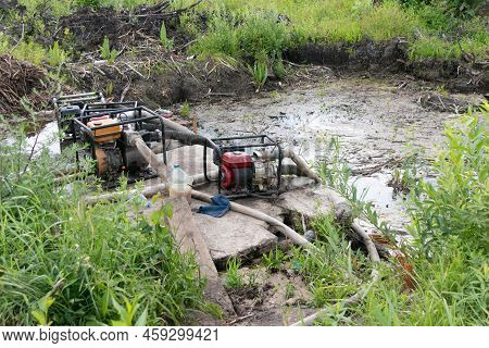 Drainage Of A Reservoir, Swamp, Lake With The Help Of High Pressure Water Pumps. Water Pumps Pump Wa