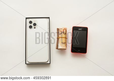 Stariy Oskol, Russia - July 5, 2021: Buying A New Iphone To Replace An Old Phone