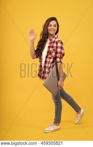 Online Way Of Getting Education. Happy Child Wave Hand Carrying Laptop. Online Courses