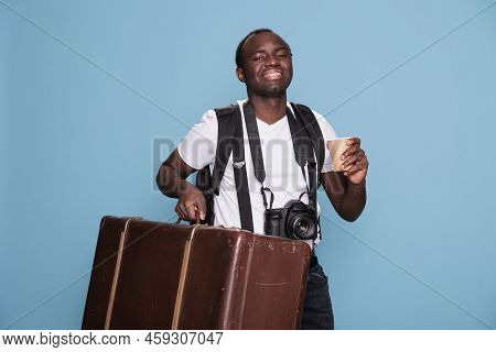 Happy Photography Enthusiast With Luggage And Dslr Camera Getting Ready For Holiday Journey Departur