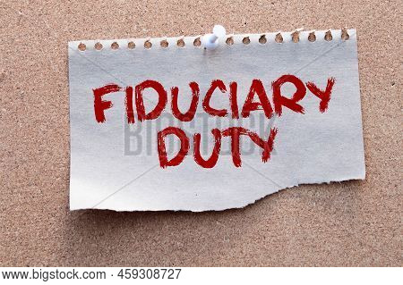 Paper With Text Fiduciary Duty On Wood Table