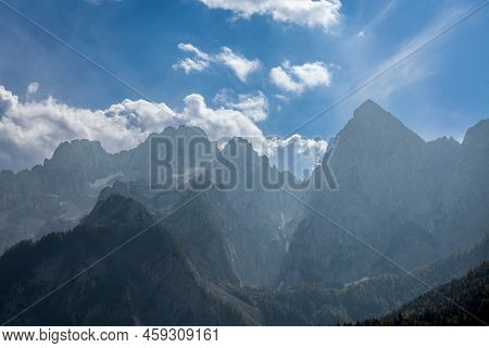 Selective Blur On Triglav Mounts In The Julian Alps, In Slovenia, By Bohinj, During A Sunny Afternoo
