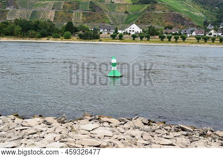 Marker For The River To Be Deep Enough Or Ship, Very Close To The Shore