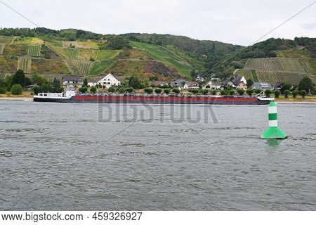 Namedy, Germany - 08 01 2022: Red And Black Rhine Ship Of The Typical Size