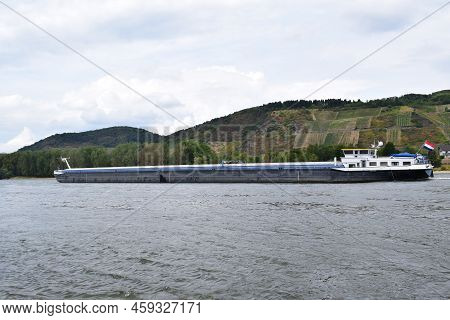 Namedy, Germany - 08 01 2022: Cargo Ship On The Rhine During Low Water Level Summer