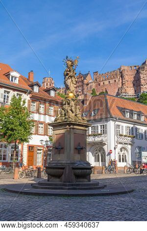 Heidelberg, Germany: June, 2. 2022: Kornmarkt (trans.: Grain Market) In Heidelberg, Germany With St.