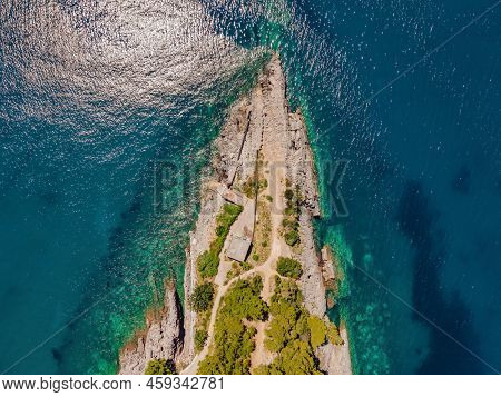 Picturesque Sea Adriatic Coast Of Montenegro. Turquoise Mediteran Sea And Rocky Shore With Evergreen