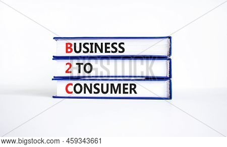 B2c Business To Consumer Symbol. Concept Words B2c Business To Consumer On Books On A Beautiful Whit