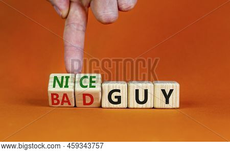 Nice Or Bad Guy Symbol. Businessman Turns Cubes And Changes Concept Words Bad Guy To Nice Guy. Beaut