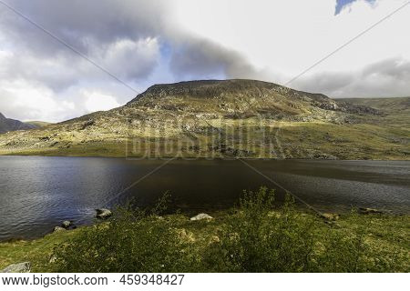 Beautiful Lake And Mountains Sun And Cloud. Ogwen Cottage, Snowdonia, Wales, Wideangle.