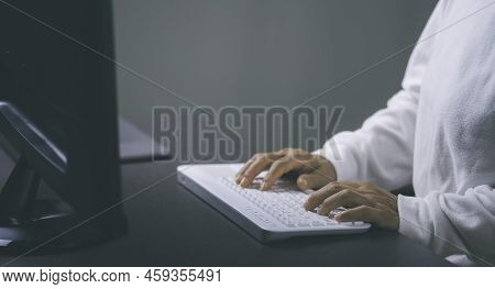 Young Woman Working In Front Of The Computer On The Desk ,online Documentation Database And Process 