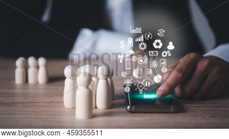 Young Businessman Using The Phone To Search For Information,international Business Network Worldwide