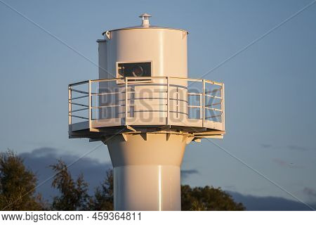 Rowy, Poland - Circa September 2015: Lighthouse At The Mouth Of The Harbor In Rowy Circa September 2