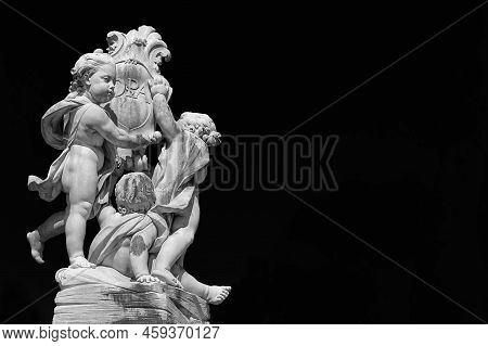 Fontana Dei Putti (fountain With Angels), Erected In 1765 In Front Of The Leaning Towe Of Pisa (blac
