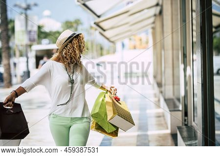 One Beautiful Woman With Shopping Bags Doing Shopping In A Mall Alone - Rich Adult Spending Money In