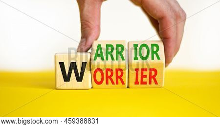 Be Warrior Not Worrier Symbol. Concept Words Warrior And Worrier On Wooden Cubes. Businessman Hand. 