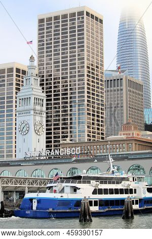 July 24, 2022 In San Francisco, Ca:  Ferry Boat Docked At The Historical Ferry Building With The Clo