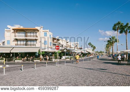 Paphos, Cyprus - Oct 29, 2014: Poseidonos Ave, Paphos, Cyprus With People Tourists And Locals Near T