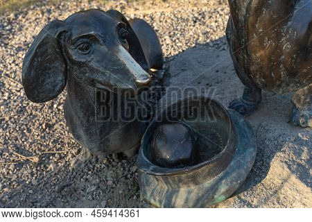 Moscow Region, Russia - November 21, 2019: Bronze Muzzle Of The Dog Dachshund Close-up