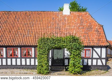 Front Facade Of A White Half Timbered House In The Historic City Of Aarhus, Denmark