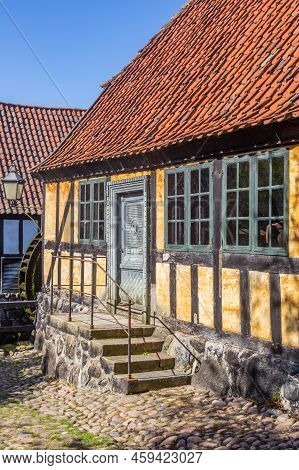 Cobblestoned Street With A Historic Half Timbered House In Aarhus, Denmark