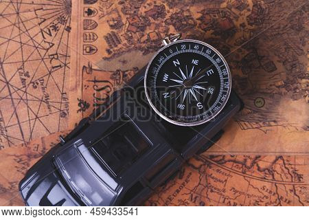 Tourist Travel By Car. Travel By Car. Compass And Car. Autotourism. Traveling Across Countries By La