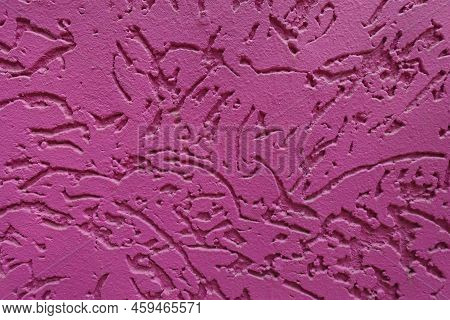 Textured Surface Of Fuchsia Colored Worm Stucco Wall Finish