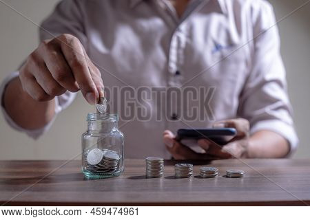 Save Money And Account Banking For Finance Concept, Piggy Bank With Coin On Blurred Background, Save