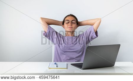 Girl Student Finished Online Learning Relaxing On A Chair. High Quality Photo