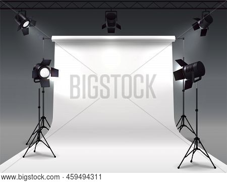 Spotlights Realistic Composition With Cyclorama And Studio Spot Lights Hanging On Reel And Mounted O