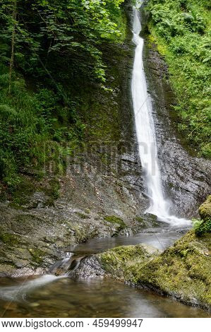 Long Exposure Of The White Lady Waterfall On The River Lyd At Lyford Gorge In Devon