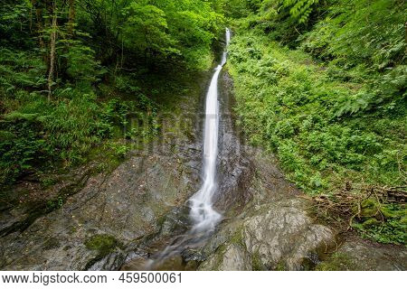 Long Exposure Of The White Lady Waterfall On The River Lyd At Lyford Gorge In Devon