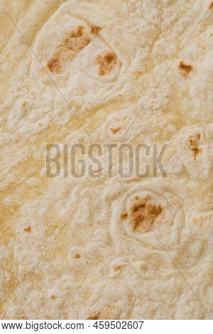 Plain Wheat Tortilla Wraps. Spanish Or Mexican Circular Unleavened Flatbread From Wheat Flour. Ingre