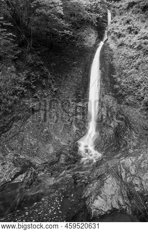 Long Exposure Of The White Lady Waterfall On The River Lyd At Lyford Gorge In Devon